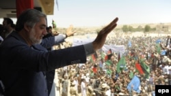 Afghan presidential candidate Abdullah Abdullah speaks to supporters during a campaign appearance in Baghdis, Afghanistan, on June 2.