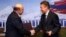 Russia - Gazprom Chairman Alexei Miller (R) and Armenian Energy Minister Armen Movsisian sign a final deal in Moscow giving Gazprom 100 percent ownership of Armenia's gas distribution network, 16Jan2013.