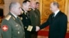 Russian Colonel General Nikolai Tkachyov (left) attends a meeting President Vladimir Putin at the Kremlin in Moscow in March 2007.