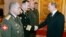 Russian Colonel General Nikolai Tkachyov (left) attends a meeting President Vladimir Putin at the Kremlin in Moscow in March 2007.