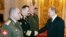 Russian General Nikolai Tkachyov (left) attends a meeting with President Vladimir Putin (right) at the Kremlin in 2007.