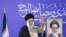 Current Supreme Leader Ayatollah Ali Khamenei flanked by a photo of his predecessor, Ruhollah Khomeini, in Mashhad in 2007