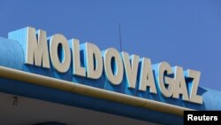 The logo of Moldovagaz energy company is on display in Chisinau