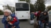 Civili evacuați din regiunea Herson, controlată de ruși, sosiți în Crimeea, Ucraina, 20 octombrie 2022.