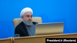 Iranian President Hassan Rohani attends a meeting with health ministry top officials in Tehran, June 25, 2019