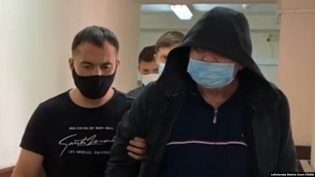 Aleksandr Kuranov is escorted to a hearing at Moscow's Lefortovo district court in August 2021.