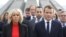 French President Emmanuel Macron (left), first lady Brigitte Macron, members of the French delegation, and Armenian officials visit the Tsitsernakaberd Armenian Genocide Memorial in Yerevan in October.