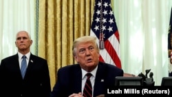 U.S. President Donald Trump speaks during a meeting with Serbia's President Aleksandar Vucic and Kosovo's Prime Minister Avdullah Hoti at the White House in Washington, U.S., September 4, 2020. REUTERS/Leah Millis