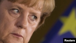 У германских политиков накопилось много вопросов к канцлеру Ангеле Меркель