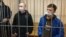 Mikita Zalatarou (right) and Dzmitry Karneyeu in the court in Homel, Belarus