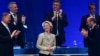 European Commission President Ursula von der Leyen (center) is applauded by (left to right) Romanian President Klaus Iohannis, Austrian Chancellor Karl Nehammer, Croatian Prime Minister Andrej Plenkovic, Greek Prime Minister Kyriakos Mitsotakis, and EPP head Manfred Weber at the EPP congress in Bucharest on March 7.