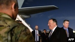 U.S. Secretary of State Mike Pompeo (second from right) upon arrival at Baghdad International Airport on May 7