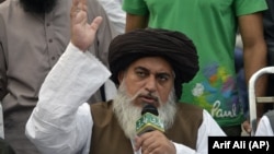 TLP head Khadim Hussain Rizvi speaks to supporters during a protest following the Supreme Court's decision to acquit Asia Bibi of blasphemy, in Lahore on November 2.