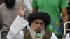 FILE: Khadim Hussain Rizvi, head of the Tehrik-e Labaik Pakistan, a hard-line religious political party, speaks to supporters in November 2018.