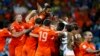 The Netherlands players celebrate after winning their penalty shootout in their 2014 World Cup quarter-finals against Costa Rica at the Fonte Nova arena in Salvador July 5, 2014. REUTERS/Marcos Brindicci (BRAZIL - Tags: SOCCER SPORT WORLD CUP)