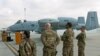 FILE: U.S air force personnel stand by an U.S. A-10 aircraft at the Kandahar airbase in January 2018.