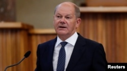 German Chancellor Olaf Scholz speaks at Charles University in Prague on August 29.