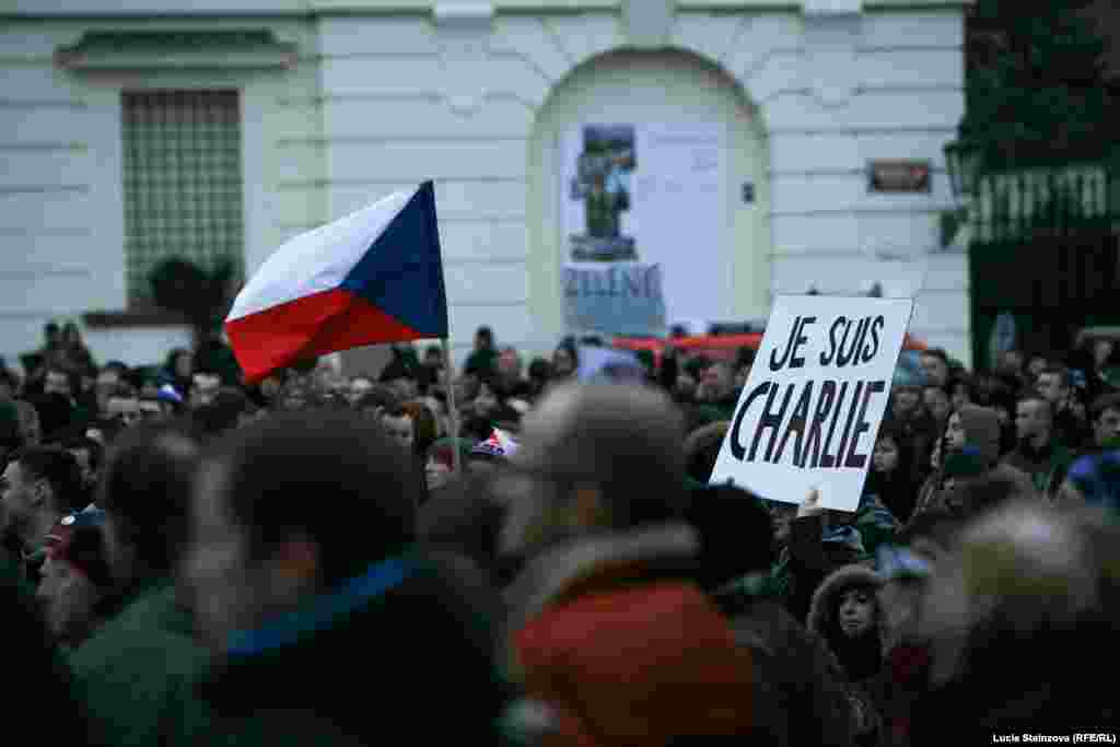 Czech Republic -- Anti-Islam demonstrators hold banners and Czech flags during a protest in Prague on January 16, 2015