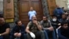 Nikol Pashinian (center) and his supporters block the entrance to the Central Bank building in Yerevan on April 17.
