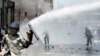 Afghans throw stones at security forces during a protest in Kabul on June, 2. (Reuters/Omar Sobhani)