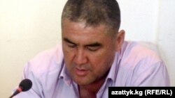 Курсан Асанов.