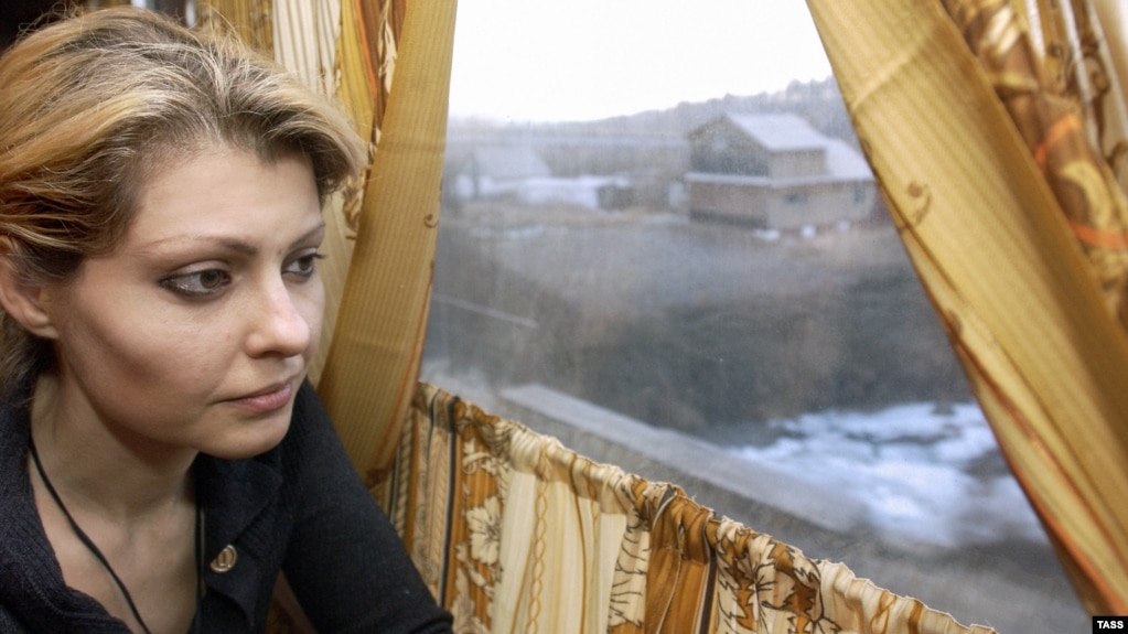 Inna Khodorkovskaya is shown traveling to visit her husband, former Yukos CEO Mikhail Khodorkovsky, as he was serving time in a penal colony in October 2005.