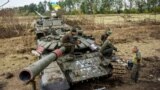 UKRAINE – Ukrainian servicemen repair a captured Russian tank in Kharkiv region, 15 September 2022