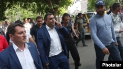 Armenia - Mayor Karen Grigorian (second from left) joins his supporters rallying in Echmiadzin, 16 June 2018.