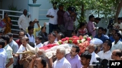 Relatives carry the body of Indian engineer Srinivas Kuchibhotla, who was shot dead in the U.S. state of Kansas, for his funeral in Hyderabad on February 28.