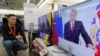 Putin Stresses National Unity, Domestic Programs In Low-Key Parliament Address