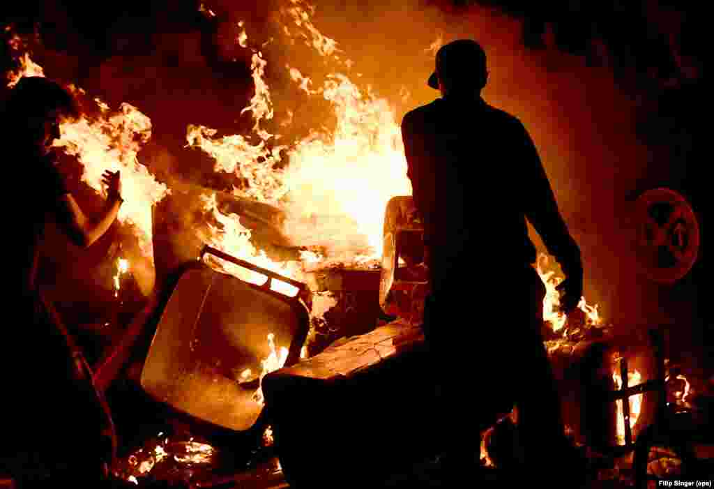 A protester burns waste ahead of the Group of 20 summit in Hamburg. (epa/Filip Singer)