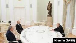 RUSSIA -- Armenian Prime Minister Nikol Pashinian, Azerbaijani President Ilham Aliyev and Russian President Vladimir Putin (left to right) attend a trilateral meeting in Moscow, January 11, 2020