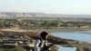 Coalition Troops Reclaim Southern Afghan Town