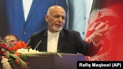 Afghan President Ashraf Ghani delivers a speech during an election campaign rally in Kabul on August 5.