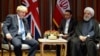 Iranian President Hassan Rohani (R) meets with British Prime Minister Boris Johnson on the sidelines of the 74th United Nations General Assembly in New York, September 24, 2019