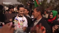 Afghan Athletes Return Home To Hero's Welcome