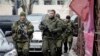 Группа сепаратистов во главе с Захарченко в центре Донецка