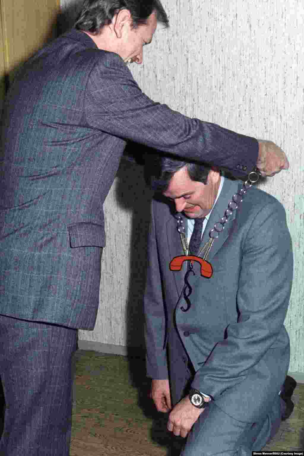 An award being bestowed on a member of a Stasi phone-tapping unit. The Stasi was a network of secret police and informers, and the most-feared branch of the GDR&#39;s communist regime.