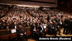 People attend a commemoration for Bosnian Croat war criminal Slobodan Praljak at Lisinski hall in Zagreb on December 11.