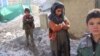 Displaced Afghans Fight Freezing Temperatures