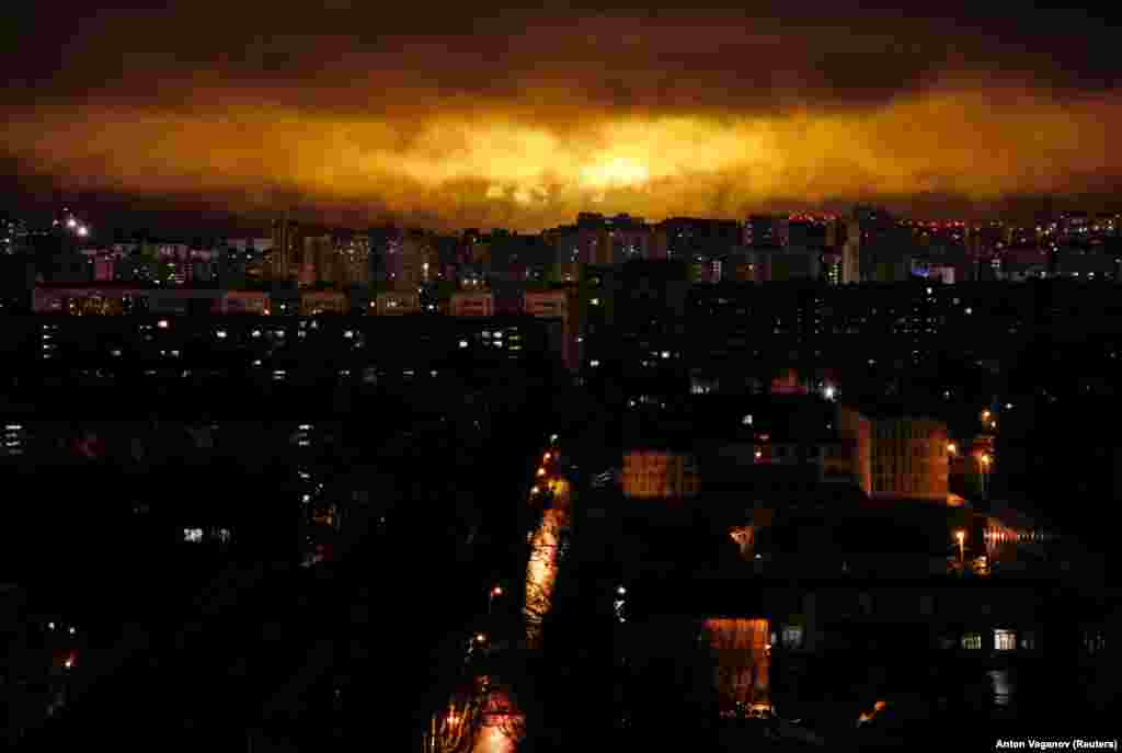 Light illuminates clouds over apartment blocks in St. Petersburg, Russia. (Reuters/Anton Vaganov)