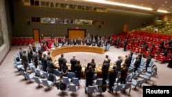 U.S. -- The United Nations Security Council observes a minute of silence upon the news of the death of former South African President Nelson Mandela, at the U.N. headquarters in New York December 5, 2013.