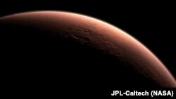 A NASA/JPL-Caltech photograph of a sunrise on Mars