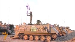 Israeli Troops Redeploy Near Gaza Border
