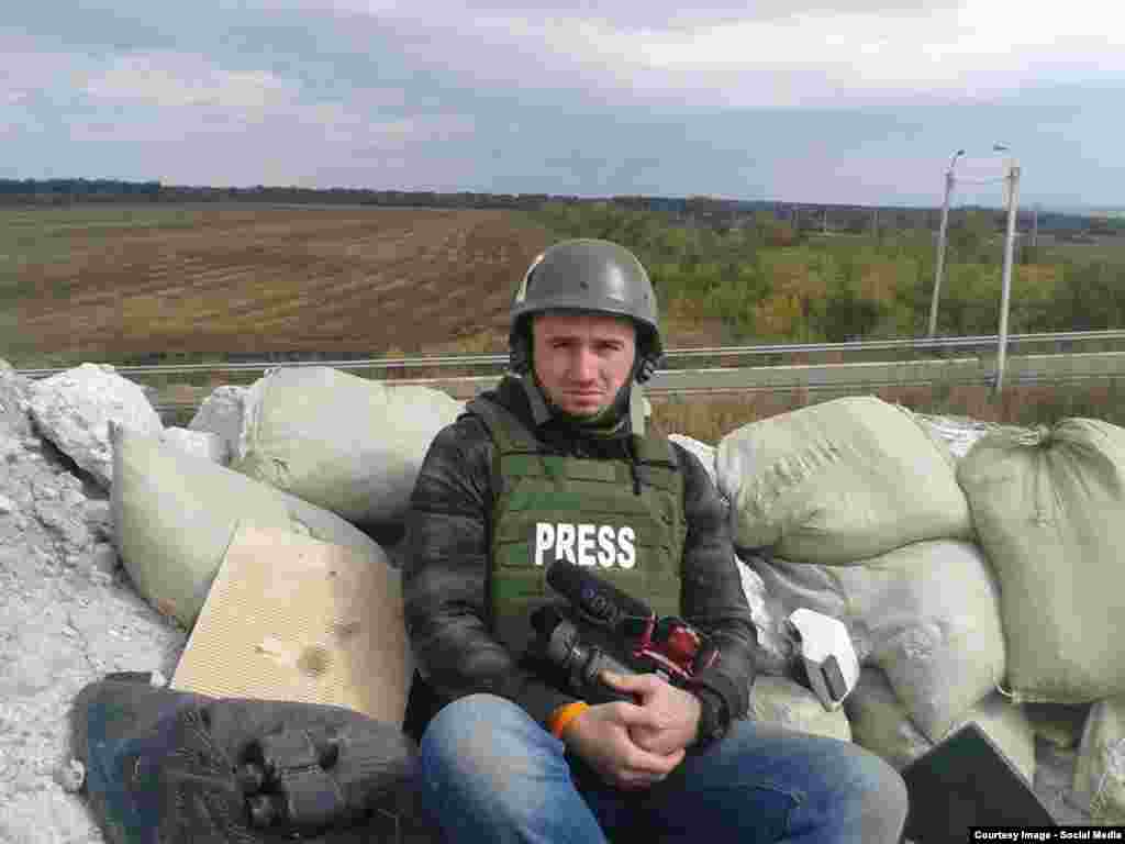 Ukraine--RFE/RL Ukrainian Service Correspondent Levko Stek near Debalcevo, eastern Ukraine. September, 2014. RFE/RL&#39;s Ukrainian Service has provided leading coverage of the war in Ukraine.