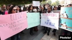 Armenia - Young women protest against government plans to cut maternity benefits, Yerevan, 23Oct2014.