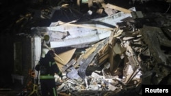 A picture shows the aftermath of a Russian missile and drone attack on the Ukrainian city of Kharkiv on October 1.