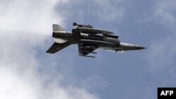 A Pakistani F-16 fighter performs a flypast during the Pakistan Day military parade in Islamabad on March 23.