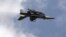 A Pakistani F-16 fighter performs a flypast during the Pakistan Day military parade in Islamabad on March 23.