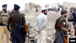 The site of a suicide car bomb attack in Bannu in February 2009